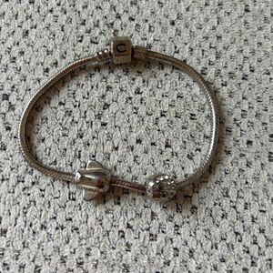 Authentic Camilia bracelet with 2 charms